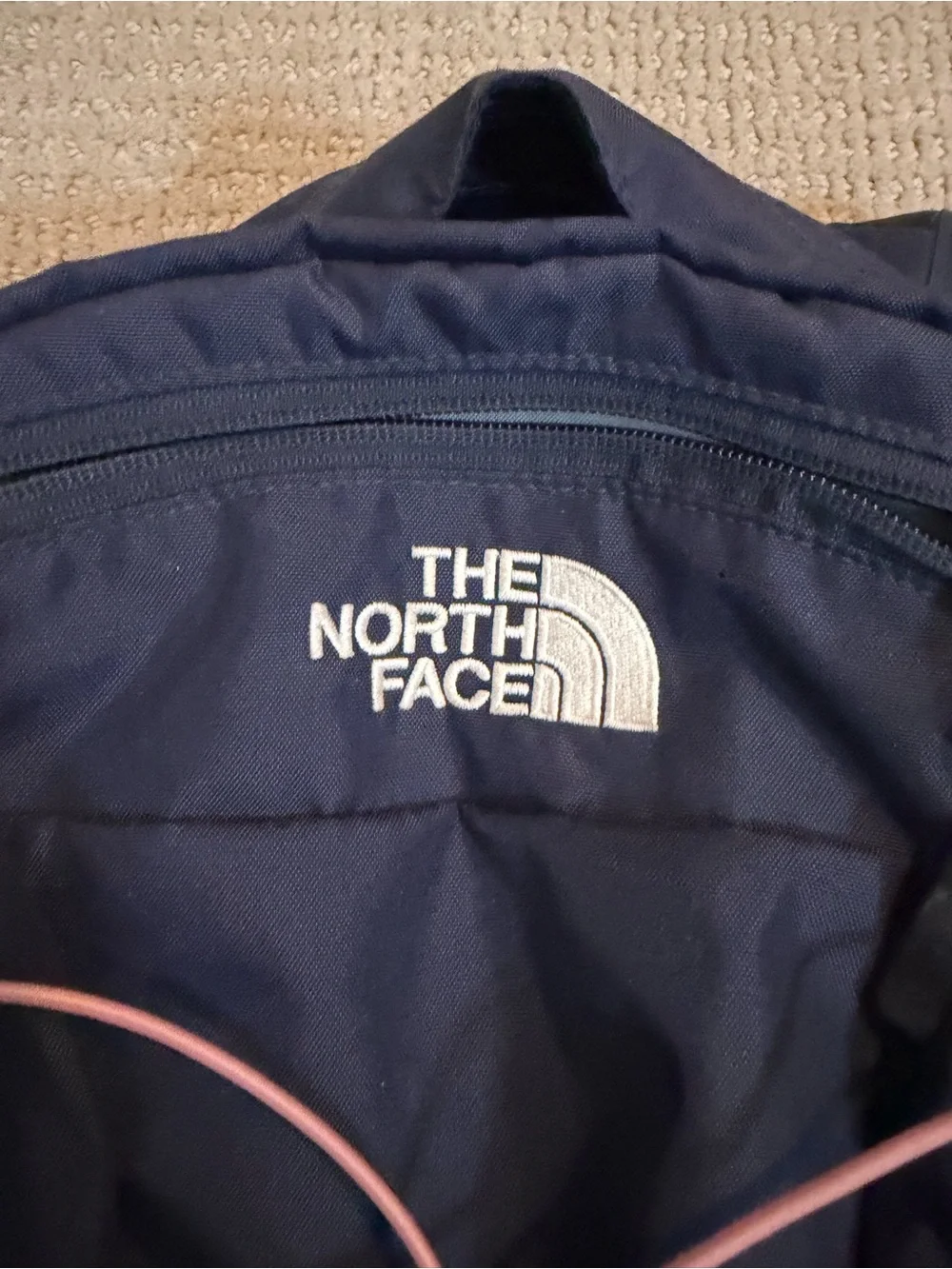 The North Face Navy Backpack with Pink Bungee Cord